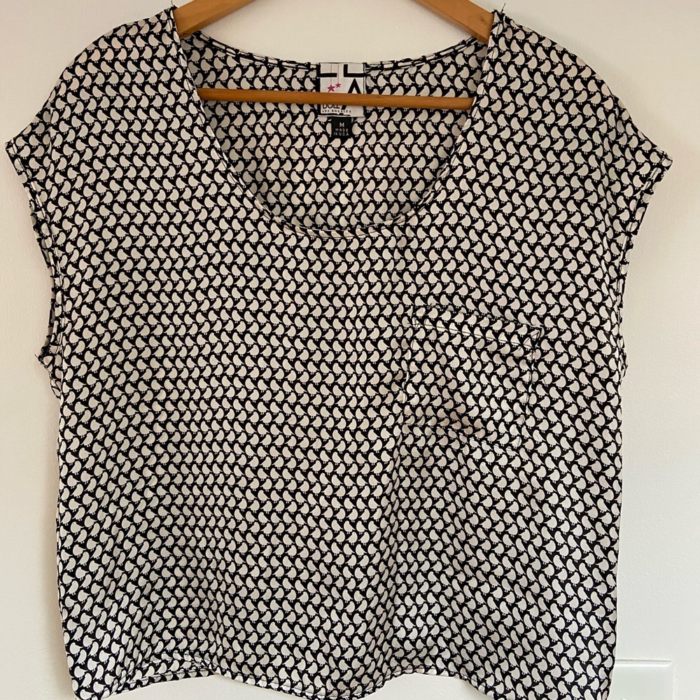 Living Doll, black and white silky bird top